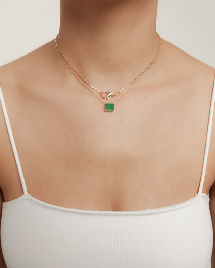 THE RED SOLITAIRE EMERALD NECKLACE