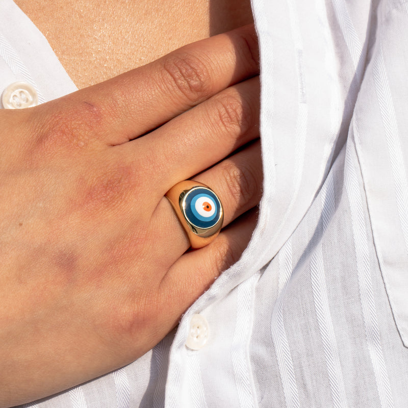 large signet ring with blue evil eye