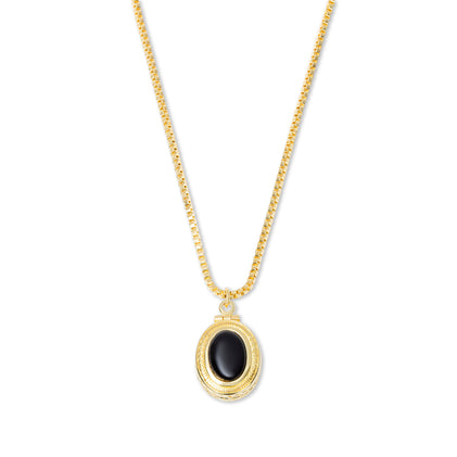 THE ONYX HEIRLOOM PENDANT NECKLACE