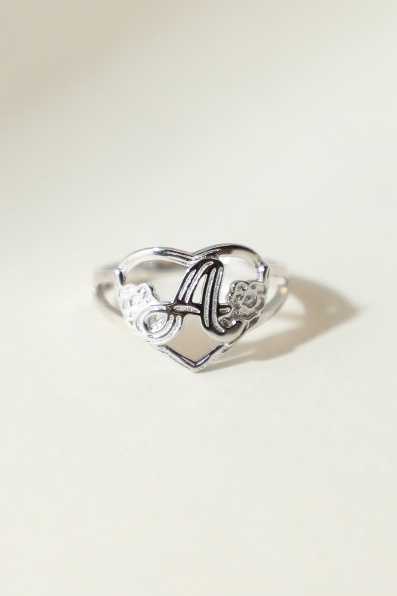 THE SILVER CUTOUT FLOWER HEART LETTER RING