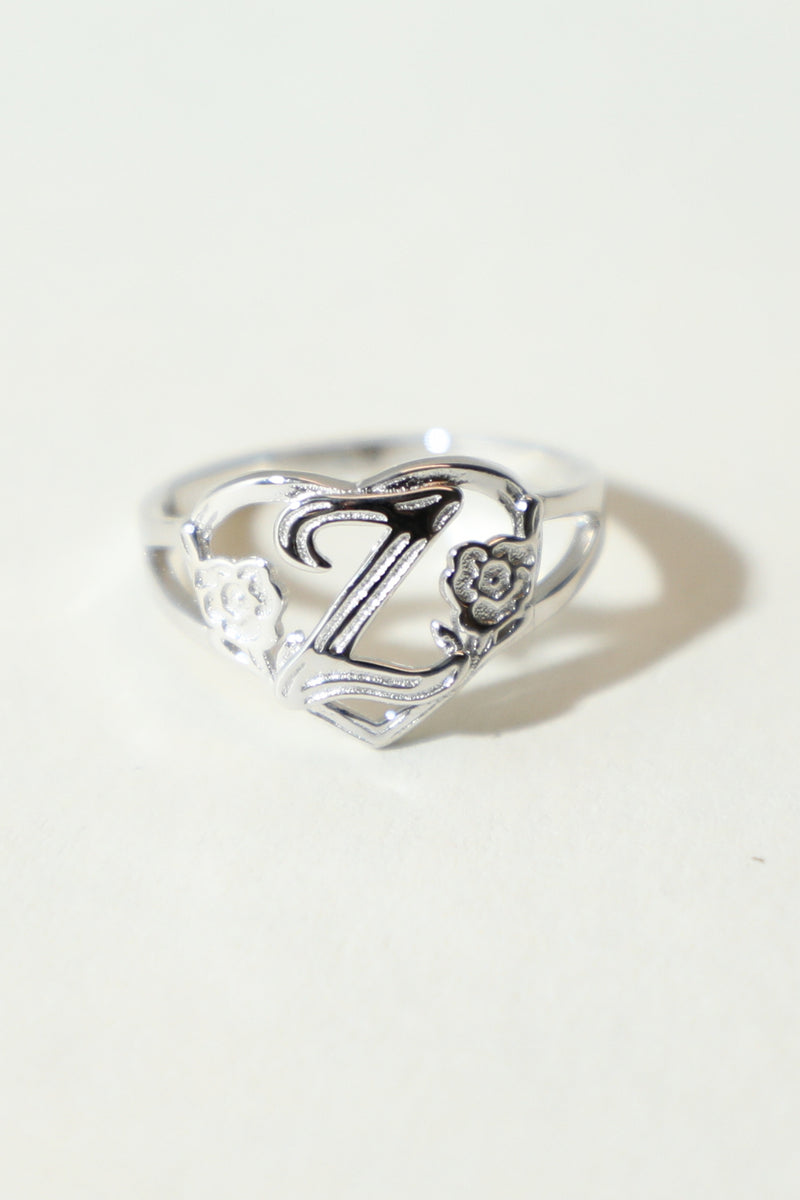 THE SILVER CUTOUT FLOWER HEART LETTER RING
