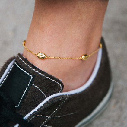 anklet with 10k gold cowrie shells