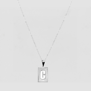 The Block Embossed Initial Pendant Necklace