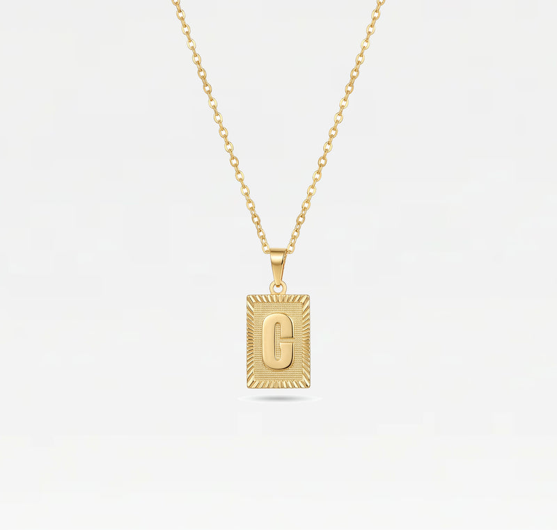 The Block Embossed Initial Pendant Necklace