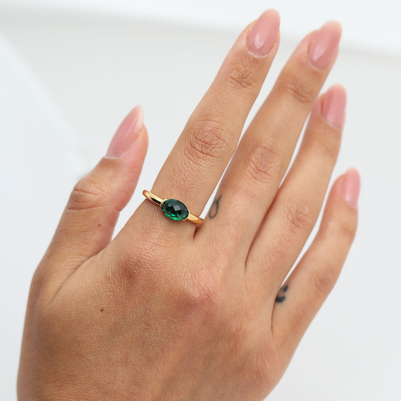 THE EMERALD STONE RING