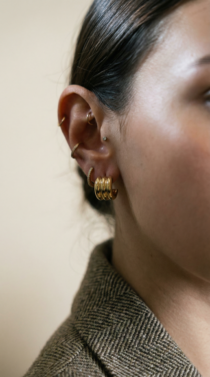 THE GOLD HUGGIE KNOT EARRINGS