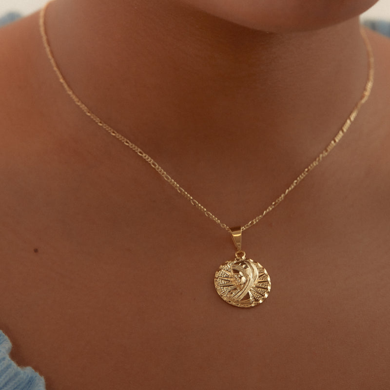 THE ROUND ORNATE MARY MEDAL NECKLACE