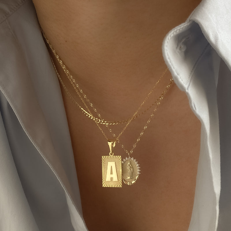 THE BLOCK EMBOSSED INITIAL PENDANT NECKLACE