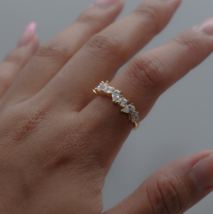 gold band ring with zirconia stones