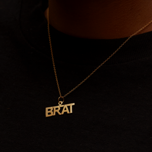 gold brat pendant necklace