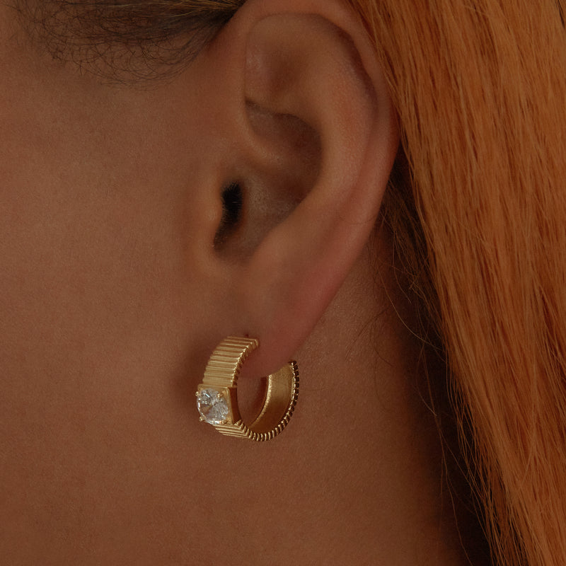 gold finish cz huggie earrings