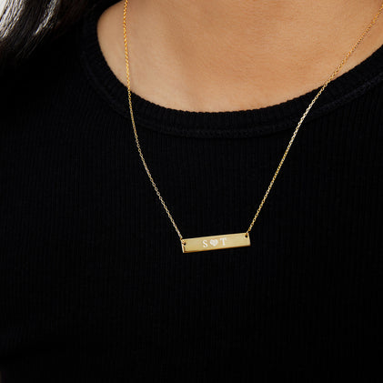 gold bar necklace with initials and heart