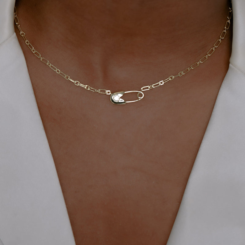 gold chain necklace with safety pin