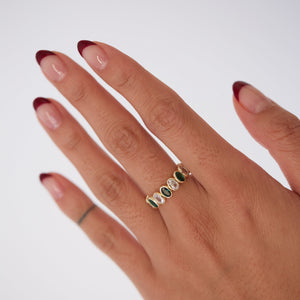 gold emerald oval eternity band ring