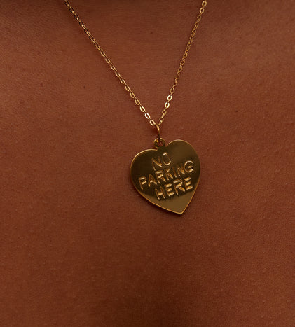 gold no parking here heart necklace